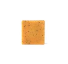 Load image into Gallery viewer, Handmade square orange soap bar with poppy seeds, photographed on a clean white background with soft natural lighting.
