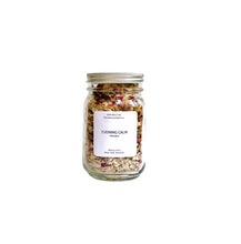 Load image into Gallery viewer, Evening Calm botanical bath tea in a glass jar on a clean white bacground.