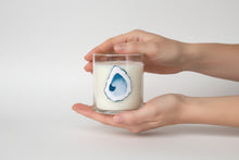 Load image into Gallery viewer, Candle in a glass jar with an oyster design on a white background