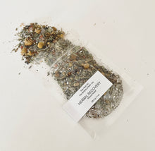 Load image into Gallery viewer, Sample pouch of Herbal Recovery bath tea with dried botanicals spilled on a clean white background.
