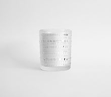 Load image into Gallery viewer, Cattleya and Ylang Ylang scented soy candle in clear hobnail glass jar on white background.