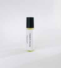 Load image into Gallery viewer, Sea Salt & Neroli perfume oil roller bottle with minimalist white label and black cap