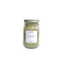 Load image into Gallery viewer, Ocean Purity bath salt in a glass jar on a clean white background.


