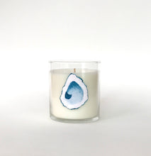Load image into Gallery viewer, Candle in a glass jar with an oyster design on a white background
