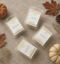 Load image into Gallery viewer, Fall wax melts featuring Autumn in My Heart, Fall in Love, Pumpkin Everything and Spiced Maple in a cozy autumn setting.
