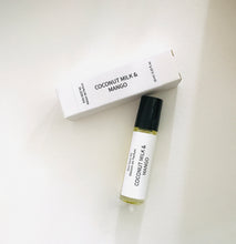Load image into Gallery viewer, Coconut Milk &amp; Mango perfume roller bottle with matching minimalist white box on a light background
