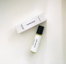 Load image into Gallery viewer, Sahara Rose perfume oil roller bottle with matching minimalist white box on a light background
