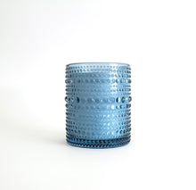 Load image into Gallery viewer, 
Jasmine and Gardenia scented soy candle in blue hobnail glass jar on white background.
