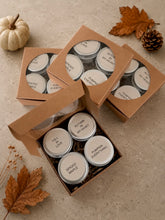 Load image into Gallery viewer, Fall tealight candle gift sets featuring Autumn in My Heart, Fall in Love, Pumpkin Everything and Spiced Maple in cozy autumn packaging.
